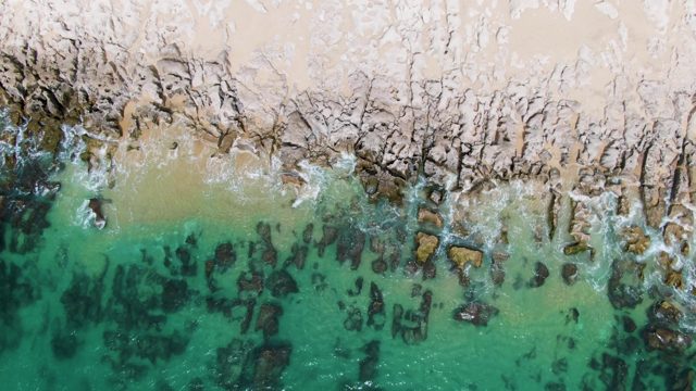 PUNTA GORDA BEACH BCS MEXICO-2023: Waves Lapping Rocky Shore From Above