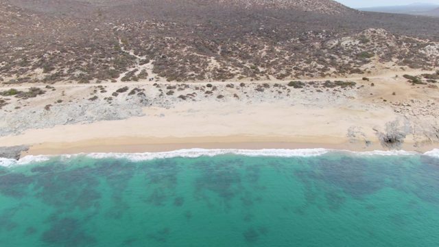 PUNTA GORDA BEACH BCS MEXICO-2023: Waves Rolling Onto Sandy Beach From Above