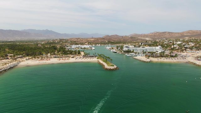 PUERTO LOS CABOS BEACH BCS MEXICO-2023: Boat Wake Moving Across Coastal Waters