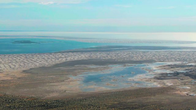 GUERRERO NEGRO BCS MEXICO-2022: Tidal Water Receding From Sandy Shore
