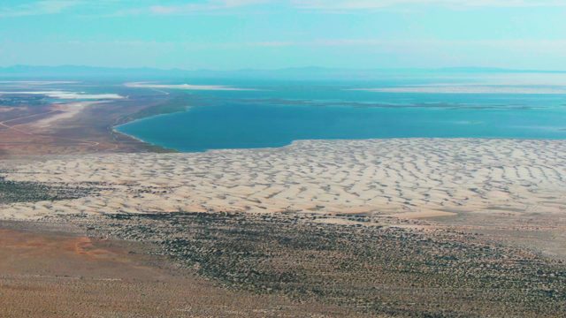 GUERRERO NEGRO BCS MEXICO-2022: Desert Dunes Meeting a Calm Blue Lake