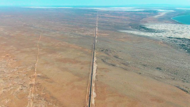 GUERRERO NEGRO BCS MEXICO-2022: Desert Highway Stretching Toward Ocean