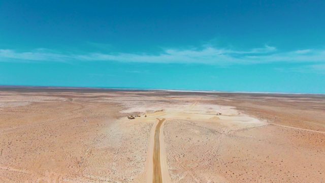 GUERRERO NEGRO BCS MEXICO-2022: Vehicle Traveling on Desert Dirt Road