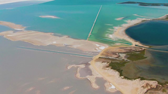 GUERRERO NEGRO BCS MEXICO-2022: Coastal Wetland with Turquoise Water and Drifting Clouds