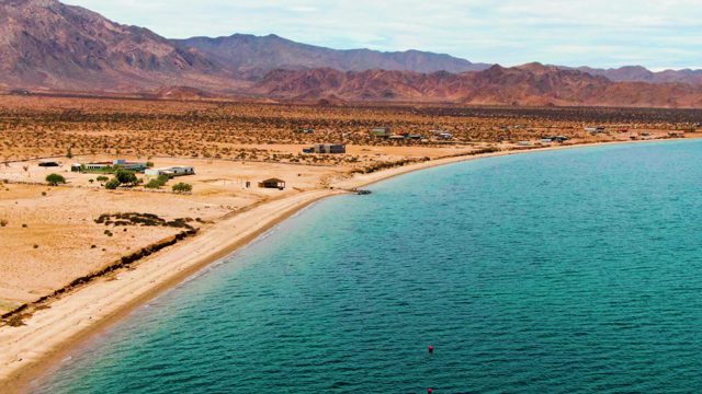 BAHIA DE LOS ANGELES BCS MEXICO-2022: Desert Beach with Turquoise Water and Mountain Backdrop