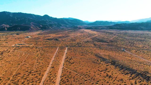 BAHIA DE LOS ANGELES BCS MEXICO-2022: Vehicle Moving on Desert Road, Aerial View