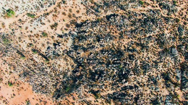 CATAVINA BC MEXICO-2022: Rugged Desert Terrain with Scattered Rocks and Sparse Vegetation