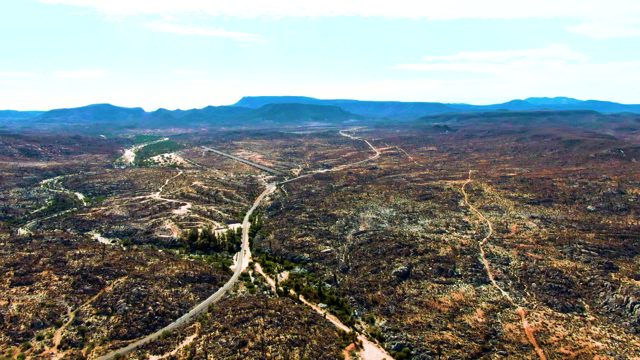 CATAVINA BC MEXICO-2022: Winding Road in Arid Terrain with Vehicle Movement