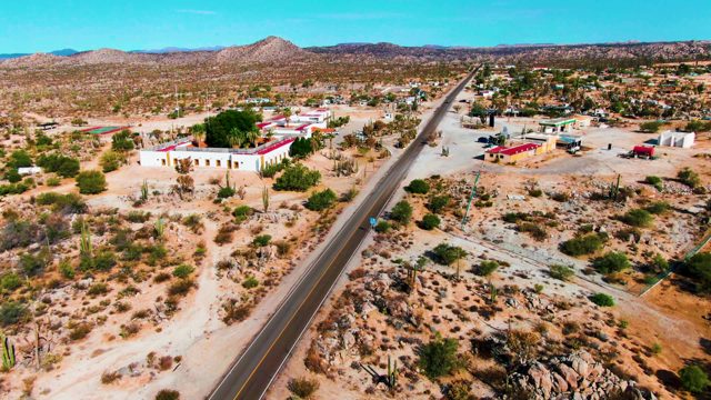 CATAVINA BC MEXICO-2022: Car Moving Along Desert Road From Overhead