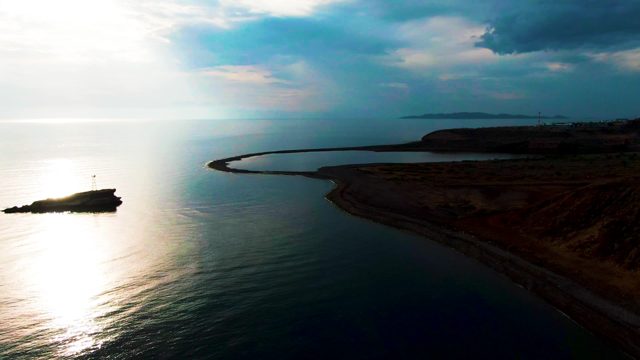 SANTA ROSALIA BCS MEXICO-2022: Coastal Island with Curved Breakwater and Rocky Shore
