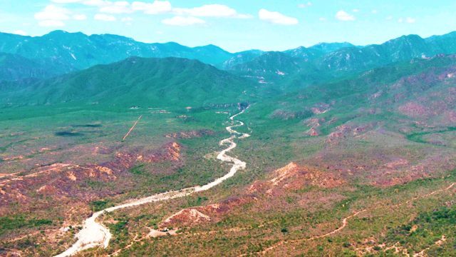 CADUANO BCS MEXICO-2022: Winding Mountain Road Through Valley