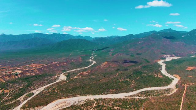 CADUANO BCS MEXICO-2022: Winding Mountain Road Through Rugged Terrain