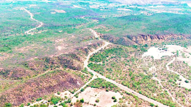 CADUANO BCS MEXICO-2022: Vehicle Moving Along Winding Rural Road