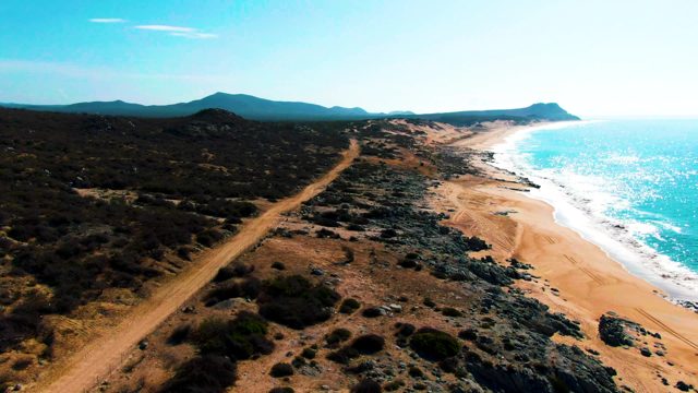 PUNTA BUZZARDS EAST CAPE BCS MEXICO-2022: Dirt Road Parallel to Sandy Beach and Ocean