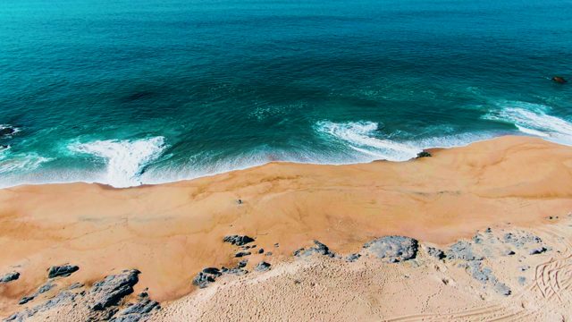 PUNTA BUZZARDS EAST CAPE BCS MEXICO-2022: Ocean Waves Crashing on Sandy Beach
