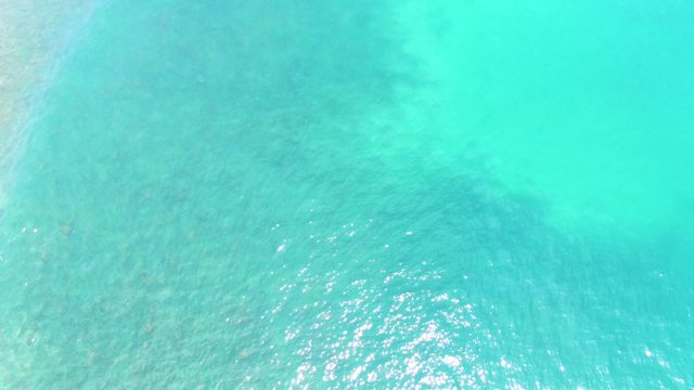 PUNTA BUZZARDS EAST CAPE BCS MEXICO-2022: Shallow Turquoise Ocean Water with Sunlight Reflections