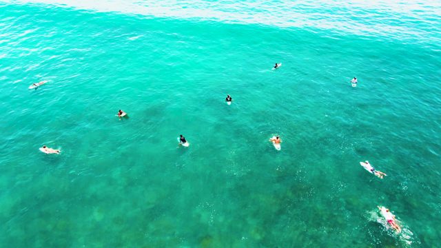 PUNTA BUZZARDS EAST CAPE BCS MEXICO-2022: People Swimming and Floating in Clear Ocean Water
