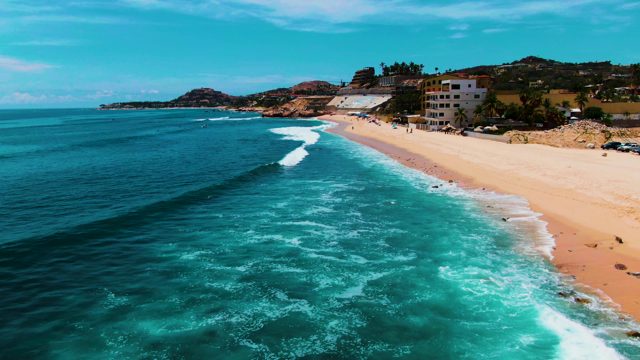 PUNTA BUZZARDS EAST CAPE BCS MEXICO-2022: Waves Rolling Onto Sandy Beach From Above