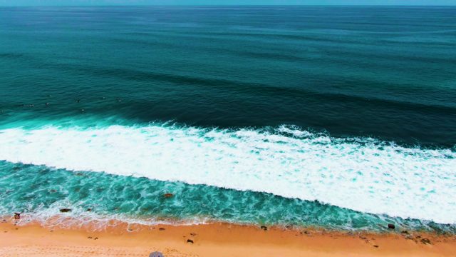 PUNTA BUZZARDS EAST CAPE BCS MEXICO-2022: Waves Crashing on Sandy Beach with People