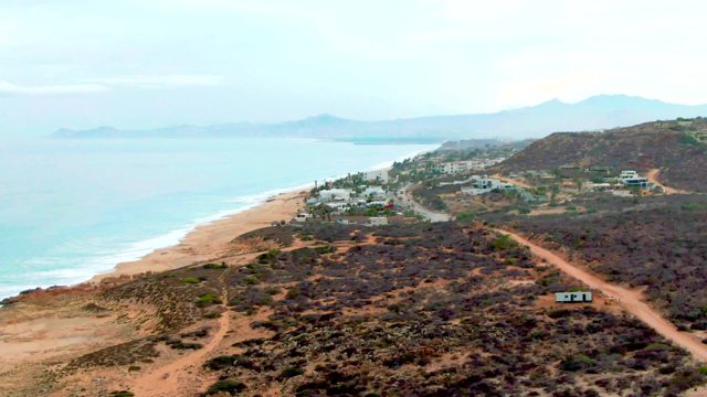 PUNTA BUZZARDS EAST CAPE BCS MEXICO-2022: Vehicle Moving Along Coastal Dirt Road