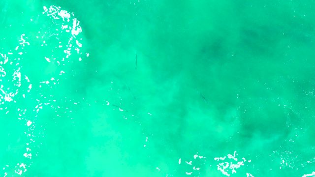 PUNTA BUZZARDS EAST CAPE BCS MEXICO-2022: Turquoise Ocean Surface with Moving Waves