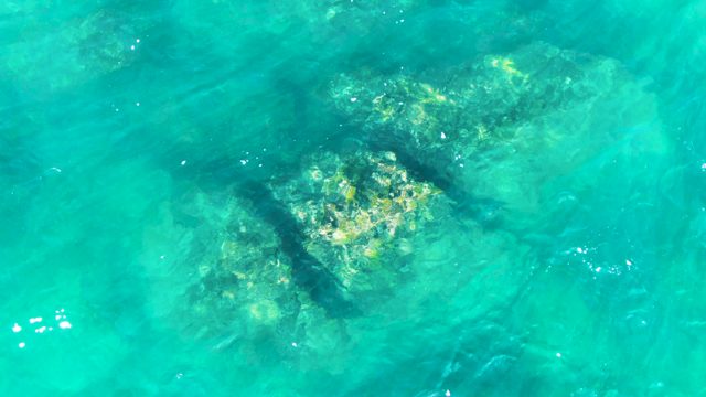 PUNTA BUZZARDS EAST CAPE BCS MEXICO-2022: Underwater Rocks Visible Through Clear Turquoise Water
