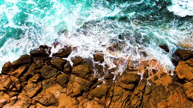 PUNTA BUZZARDS EAST CAPE BCS MEXICO-2022: Waves Crashing Against Rocky Shore