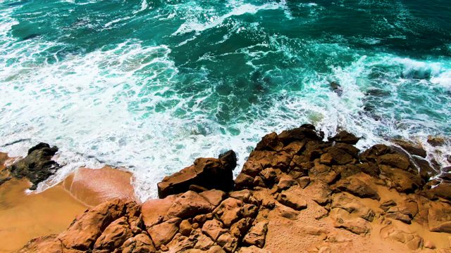 PUNTA BUZZARDS EAST CAPE BCS MEXICO-2022: Waves Crashing Against Rocky Shore