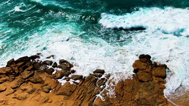 PUNTA BUZZARDS EAST CAPE BCS MEXICO-2022: Waves Crashing on Rocky Shore From Above
