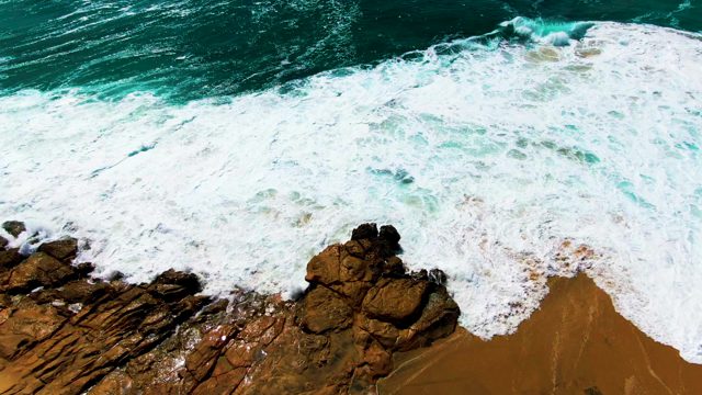 PUNTA BUZZARDS EAST CAPE BCS MEXICO-2022: Waves Crashing on Rocky Shore From Above