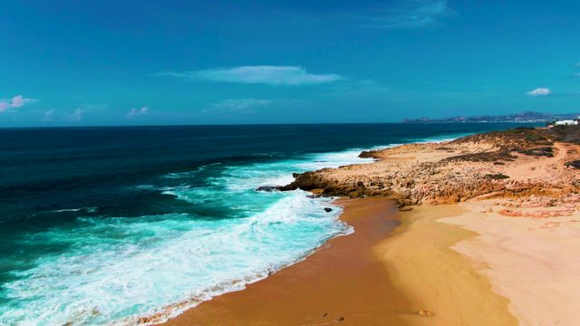 PUNTA BUZZARDS EAST CAPE BCS MEXICO-2022: Waves Crashing on Sandy and Rocky Shoreline