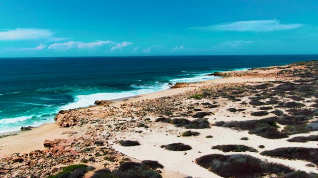 PUNTA BUZZARDS EAST CAPE BCS MEXICO-2022: Ocean Waves Crashing on Rocky Shoreline