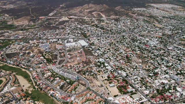 SAN JOSE DEL CABO BCS MEXICO-2022: Aerial Pan Over Residential Neighborhood