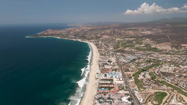 SAN JOSE DEL CABO BCS MEXICO-2022: Coastal Highway with Vehicle and Cloud Movement