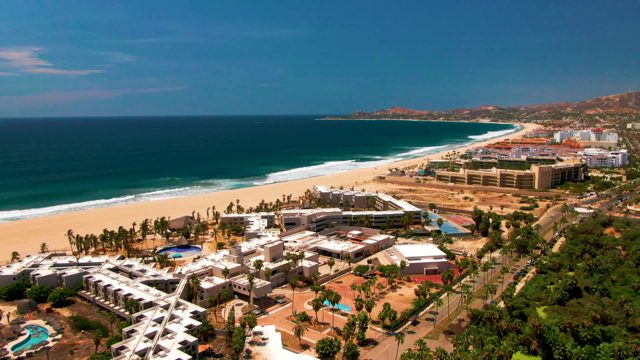 SAN JOSE DEL CABO BCS MEXICO-2022: Coastal Resort Beach with Moving Traffic and People