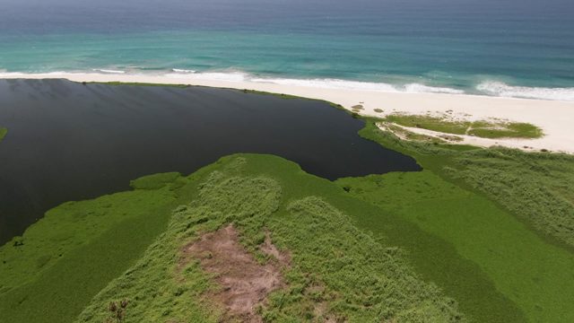 SAN JOSE DEL CABO BCS MEXICO-2022: Lagoon, White Sand Beach, and Turquoise Ocean Waves