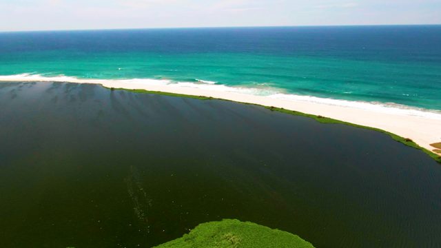 SAN JOSE DEL CABO BCS MEXICO-2022: Sandy Beach Separating Lagoon From Ocean Waves