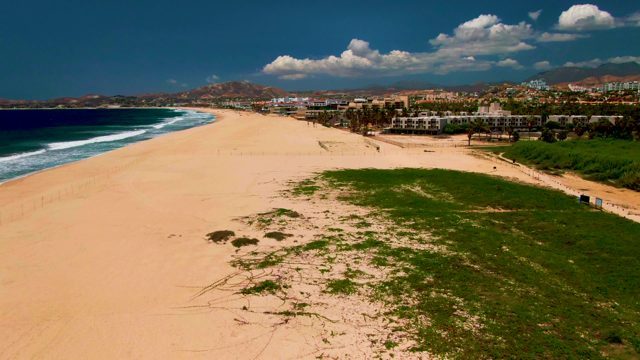 Shifting Beach Dunes and Ocean Waves