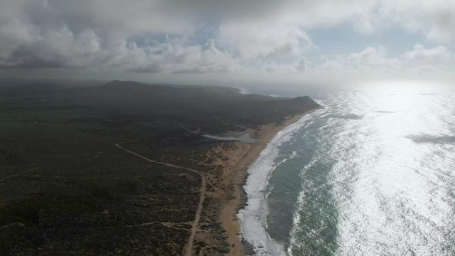 PUNTA GORDO EAST CAPE BCS MEXICO-2022: Receding Tide Exposes Sandy Shore by Ocean Waves