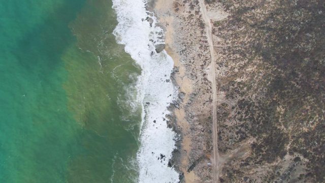 PUNTA GORDO EAST CAPE BCS MEXICO-2022: Waves Crashing on Sandy Coastline From Above