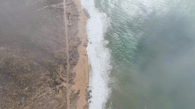 PUNTA GORDO EAST CAPE BCS MEXICO-2022: Coastal Road Along Sandy Beach and Ocean Waves