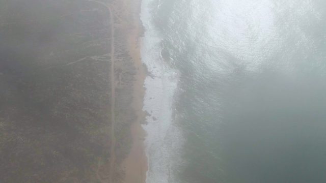 PUNTA GORDO EAST CAPE BCS MEXICO-2022: Sandy Beach and Ocean Waves Beside Coastal Road