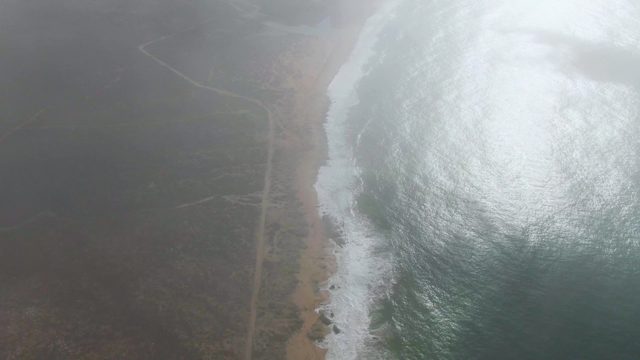 PUNTA GORDO EAST CAPE BCS MEXICO-2022: Fog Clearing Reveals Coastal Road and Sandy Shore