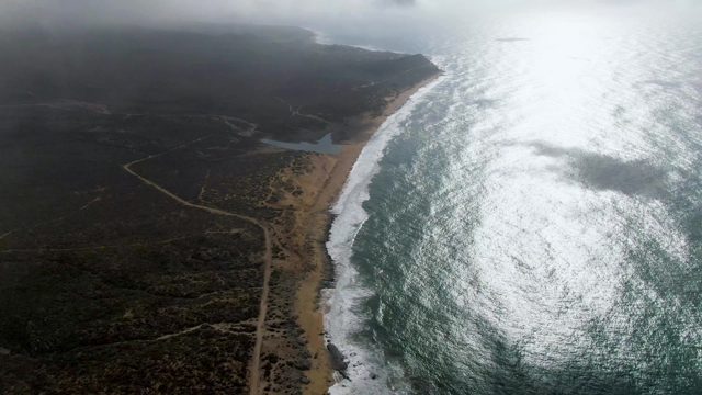 PUNTA GORDO EAST CAPE BCS MEXICO-2022: Shifting Clouds Over Coastal Beach and Ocean
