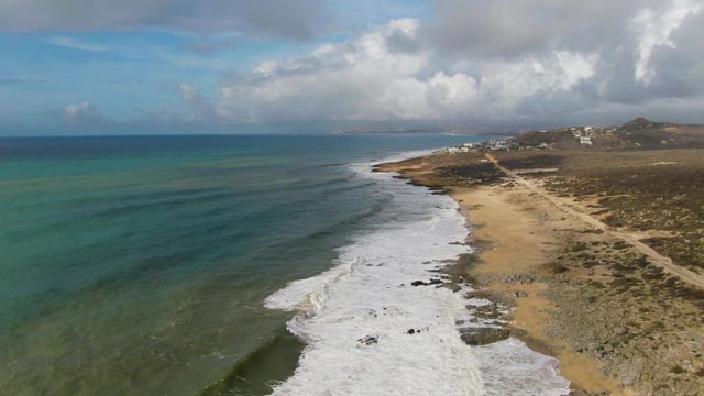 PUNTA GORDO EAST CAPE BCS MEXICO-2022: Ocean Waves Rolling Onto Sandy Beach
