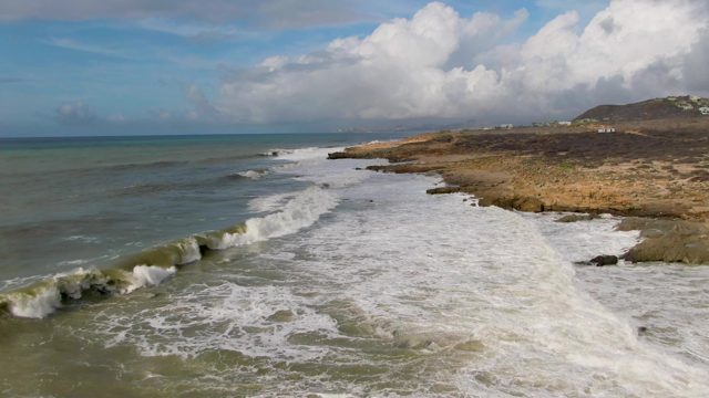 PUNTA GORDO EAST CAPE BCS MEXICO-2022: Ocean Waves Crashing on Rocky Shoreline
