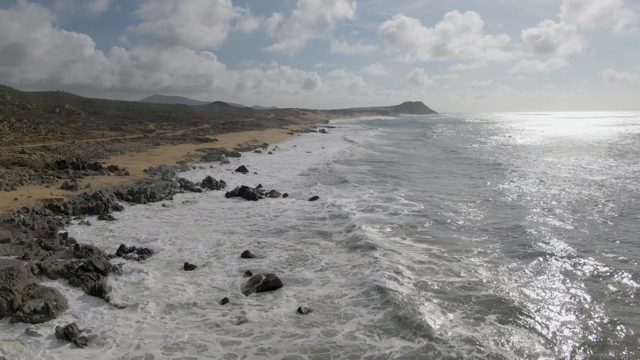 PUNTA GORDO EAST CAPE BCS MEXICO-2022: Waves Crashing on Rocky Beach Shoreline