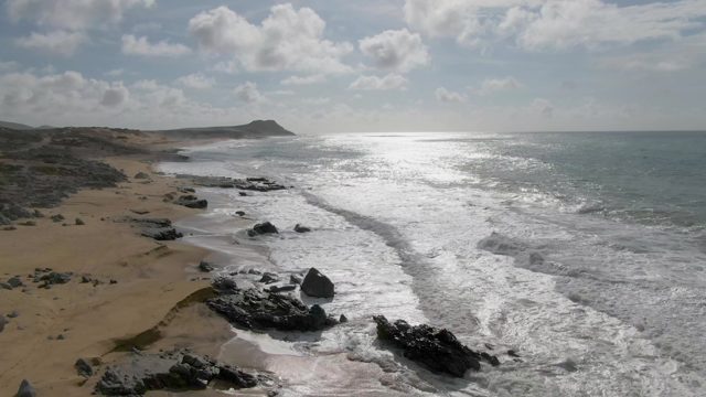 PUNTA GORDO EAST CAPE BCS MEXICO-2022: Waves Crashing on Rocky Beach Shoreline