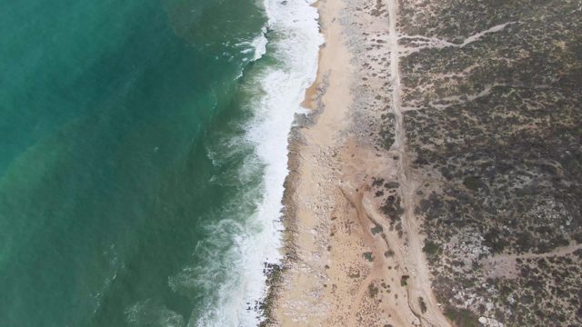 PUNTA GORDO EAST CAPE BCS MEXICO-2022: Waves Rolling Onto Sandy Coast From Overhead