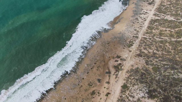 PUNTA GORDO EAST CAPE BCS MEXICO-2022: Waves Crashing on Sandy Shore Aerial